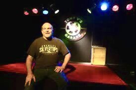 The Tony V’s Garage stage under colored lights